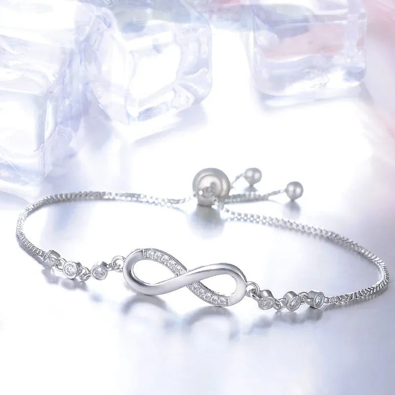 Pulseira Infinita de Strass em Metal.